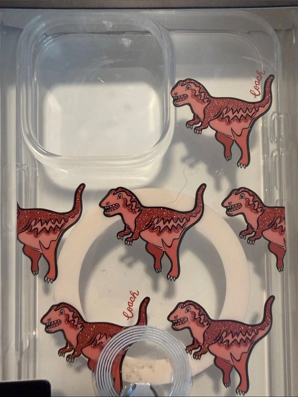 Coach Clear MagSafe iPhone 16 Pro Max Case with Red Dinosaur Print